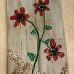 Kunstwerk bloemen op steigerhout 
